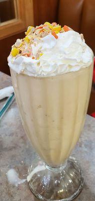 Reese's Pieces Vanilla Milk Shake $4.99 plus it comes with the stainless steel mixer cup with more shake!  3/24/2024