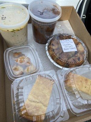 Clam chowder, beef stew, home made corn bread Ames chocolate chip bread pudding