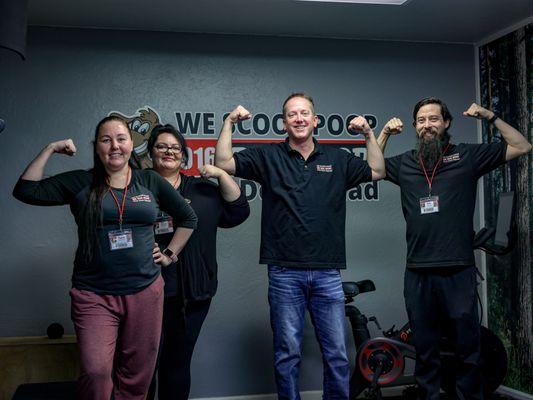 Office Support team having fun in the Doo Doo Squad Company Gym. Staying healthy to keep those yards clean!