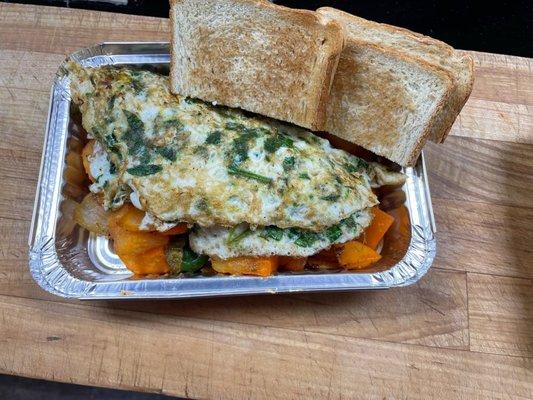 Healthy omelette with home fries and whit toast