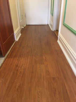 This Vinyl floor looks like hardwood floor. Great workmanship. They did a great installation job! Thank you.