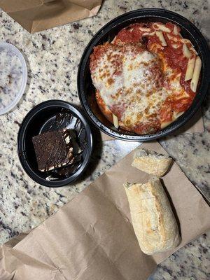 Chicken Parmigiana with penne pasta & side of bread and tiramisu, to go.