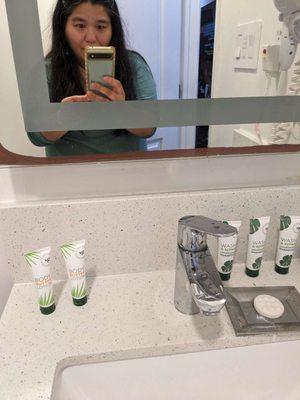 I meant to take a picture of the complimentary products & ended up taking a cliche'd mirror selfie. LOL!!!  :-D