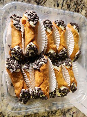 Gluten free Cannoli with Amaretto filling and tip dipped in semi sweet morsels