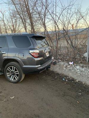 My SUV was NOT shifted back into park!Broken shift release cover&damaged the door frame on the driver side.