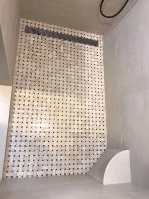 Marble mosaic shower floor with trough style drain