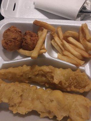 This is a photo of fish and fries without a flash