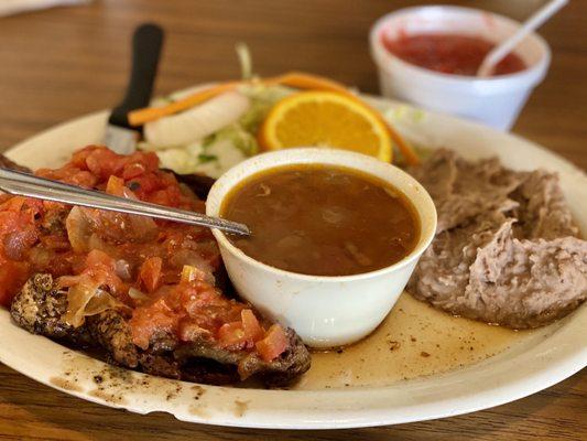 Combo Fajita Ranchera, refríes and charro beans.