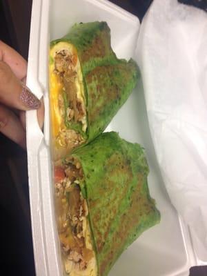 Spinach Wrap with egg, cheese, grilled chicken, tomatoes, mushrooms, and grilled onion. DBOMB.COM