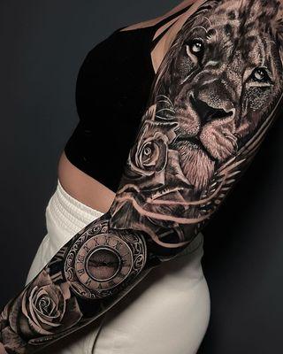 sleeve tattoo lion clock rose