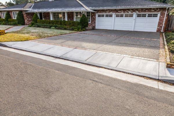 New Marin County standard driveway apron, curb and gutter. Ignacio, Novato.