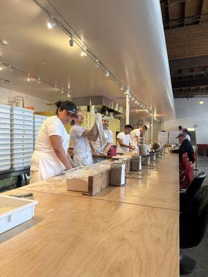 Counter area with view of pizza making