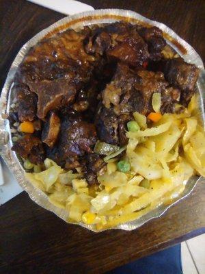 Oxtails, cabbage and peas and rice.