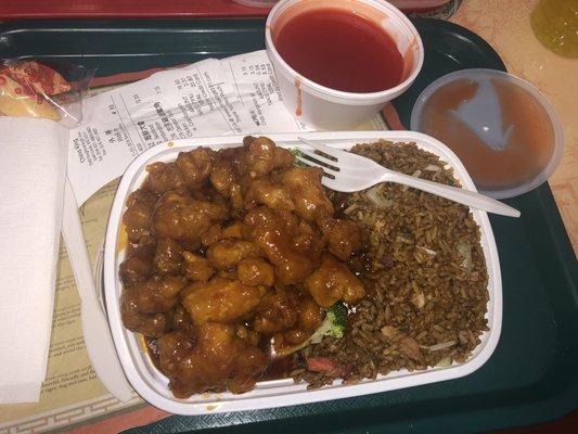 General Tso's chicken with fried rice and "red sauce" on the side