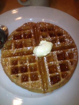 A waffle smothered in butter, with real maple syrup.   Yum!