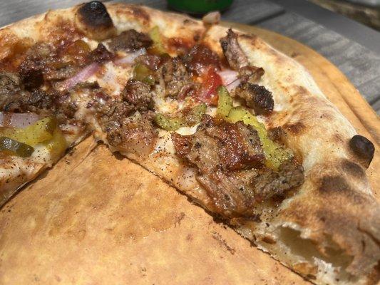 the "Tex-Italian"
Texas Brisket on a Neapolitan Style crust. 
Italian with Spurs on!