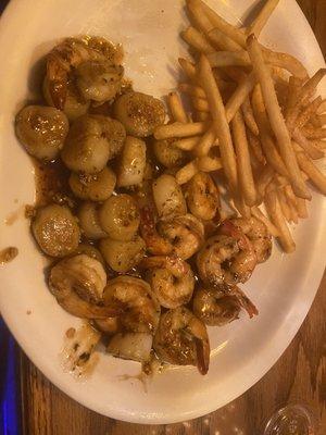 Grilled shrimp and scallops with fries