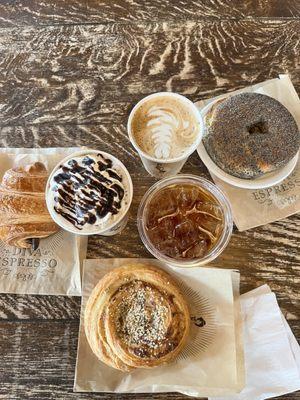 Mocha, latte, iced tea, chocolate croissant, savory pinwheel, poppyseed bagel