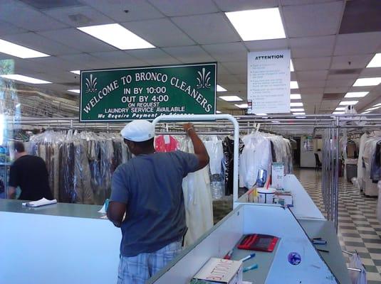 Interior of the store has a sign identifying it as Bronco Cleaners. The exterior is less distinguishable.