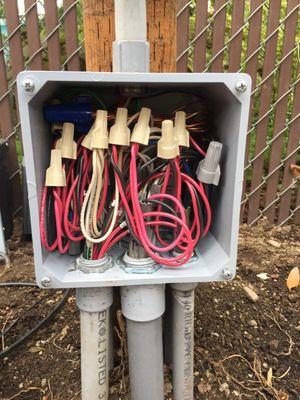 Junction box for an exterior landscape lighting and equipment project. Multiple lighting zones, power awning, and pond pump controls.