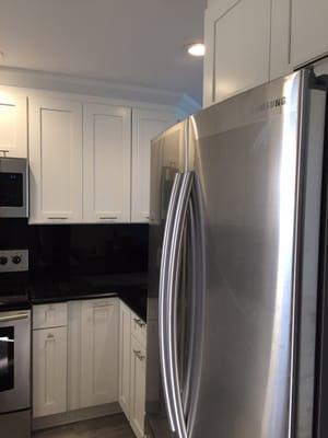 Arctic White and stainless steel appliances are a winning combination