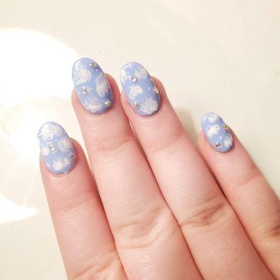 Full set acrylic nails with cloud design