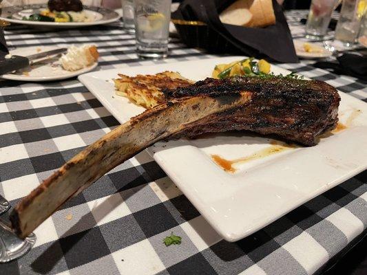 Rear end of Tomahawk 32 oz. Steak. Med rear with a delicious crust. Veggies had a lot of flavor, as well as the hash's creamy crispness.