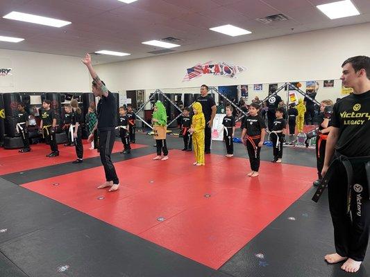 Students training on Halloween in their costumes!