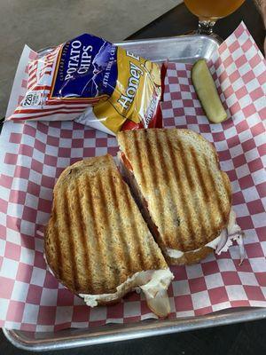 Turkey pesto panini $13.00