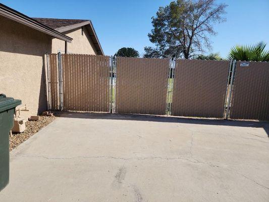 Chain link fence with privacy vinyl