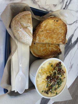 Loaded potato soup, grilled cheese, and complimentary slice of sourdough bread