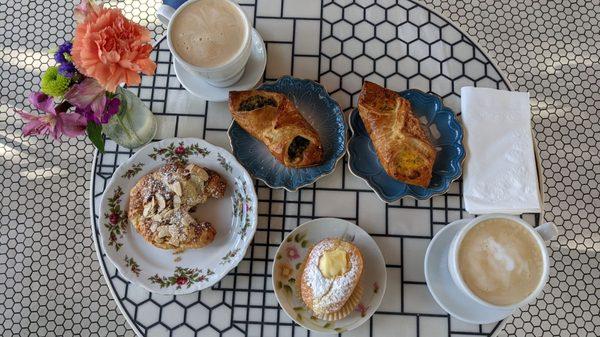 Spinach croissant, almonds croissant, beignet, café au lait