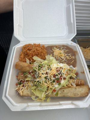 Chicken flautas rice and beans