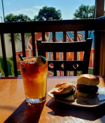 Mai tai and bacon cheeseburger sliders on the patio.  $11 sliders ($1 extra for bacon)