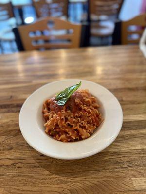 Mafaldine with Tomato and Basil sauce.