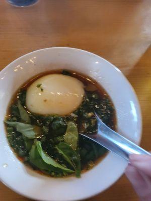 Poached egg in pork broth