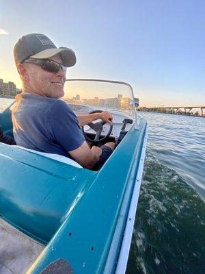 Cruise down the river in a retro boat