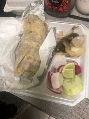 Carne asada burrito and veggies.