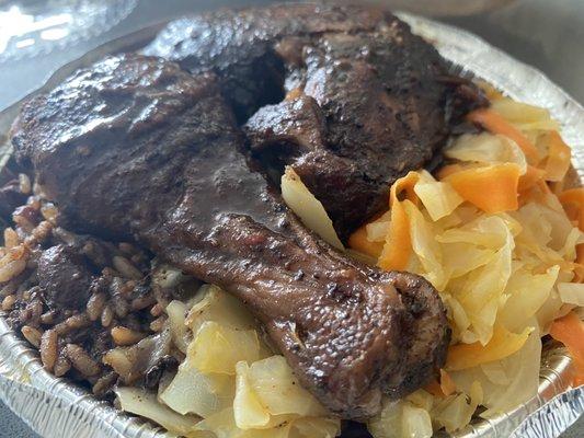 Jerk chicken entree with cabbage