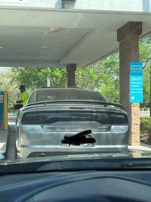 Folks are allowed to walk up to the drive through itms. Assisted by Kathy whom stated it's dangerous, but she still allowed it