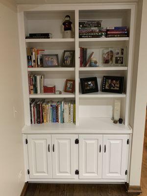 New cabinet from Springbrook Cabinetry that matches cabinet on other side of the room.