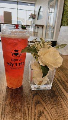 Dragon fruit tea with fruit flavor crystals boba. Light sweetness and perfect for hot day