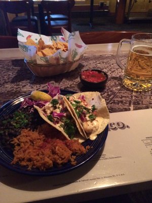 Shrimp tacos beer and shots of jd. What's better than that. I can't figure out why this place only has 2 stars. Should be 4 at least