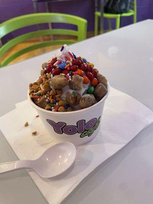 Original Frozen Yogurt with cookie dough topping, rainbow sprinkles, mini m&ms and peanut butter chips