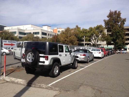 There are over 20 parking spots at this lot on P Street between 11th & 12th. Rates:  $3 for an hour, $10 for 3, $15 for all day.