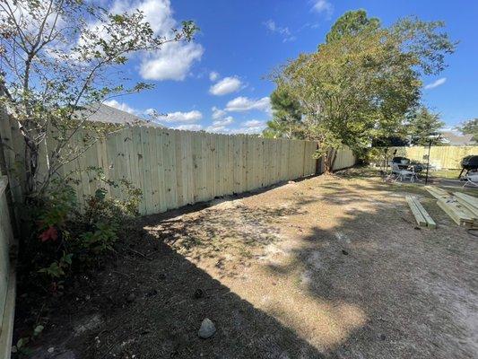 Custom built privacy wood picket fence