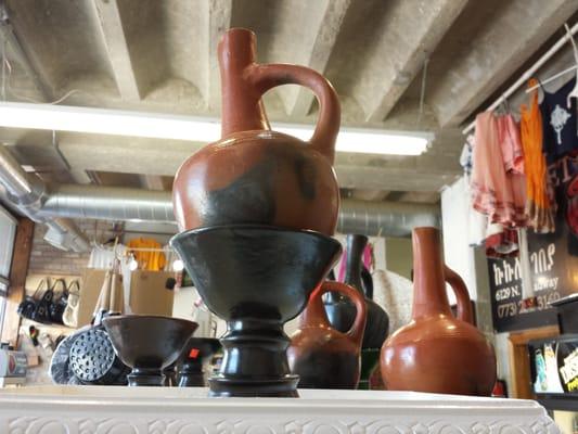 Ethiopian grains, coffee, and coffee pots.