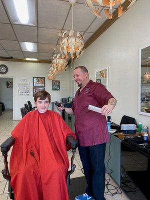 Having a laugh with the son part of a father and son Haircut.