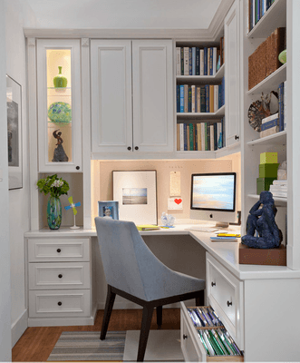 Custom built-in corner desk with L-shelves to fully utilize space