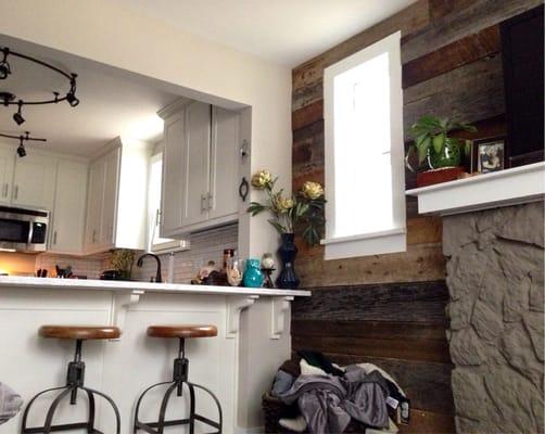 Reclaimed barn wood accent wall done by Josh.